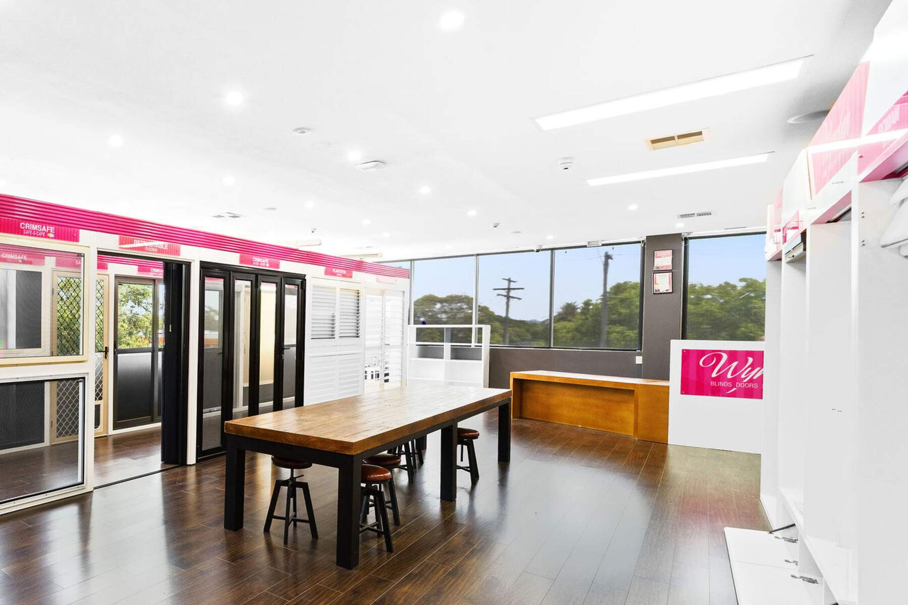 The showroom with timber floors, high ceilings and glazing to Victoria Road